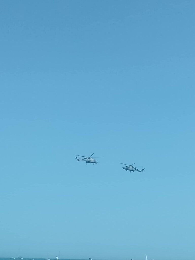 A pair of Leonardo WIldcat helicopters over the sea